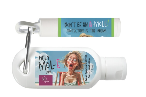 branded small tube of tanning cream on a key chain